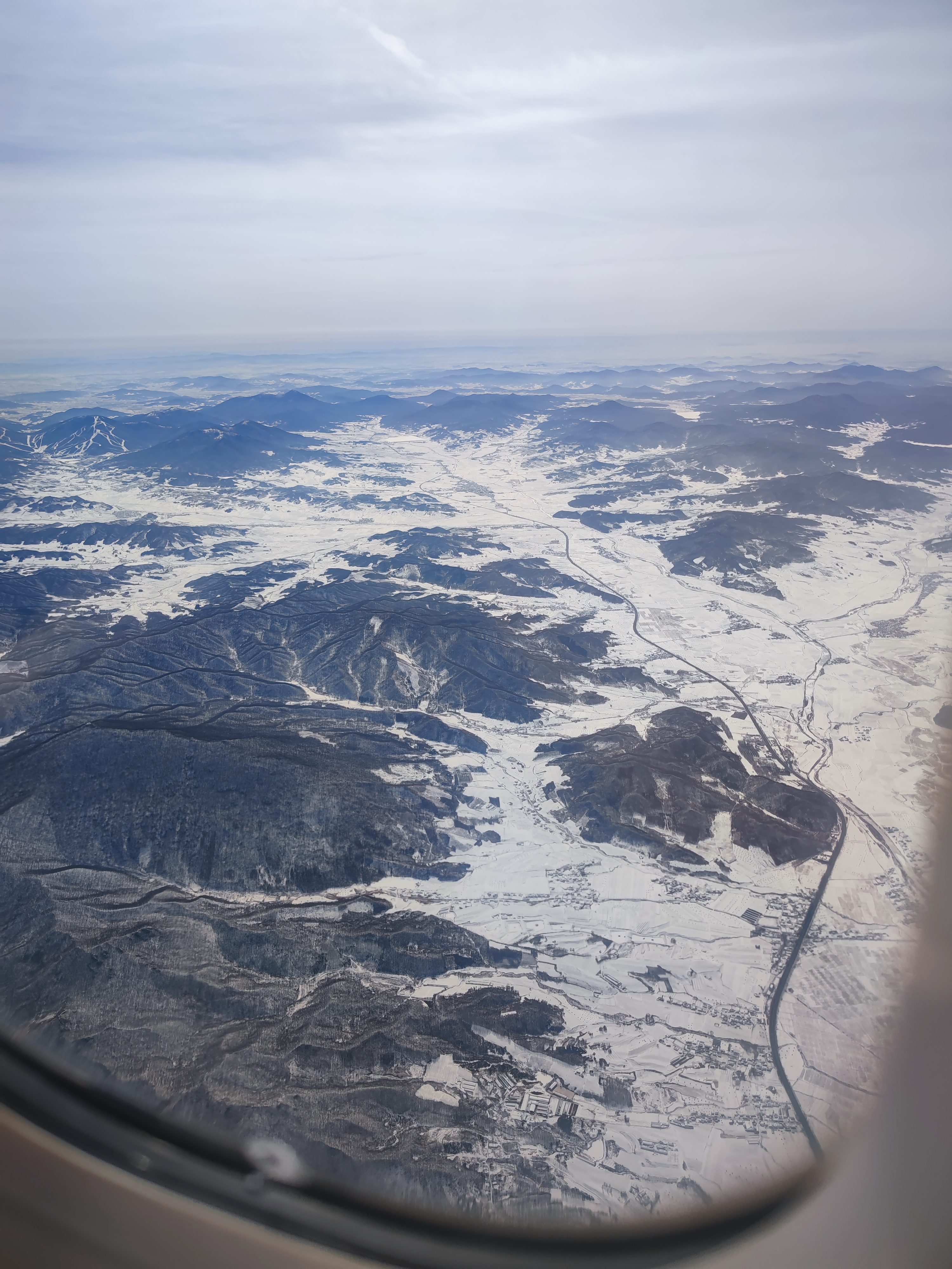 240224 风景-飞机视角下的长白山区.jpg